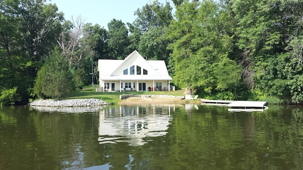 View of house from lake
Beach and boat dock 