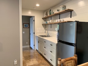 Kitchen with appliances to cook any meal.