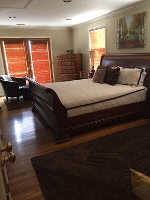 Master bedroom with fireplace and sitting area.