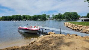 View from beach. Plenty of dock space for boats, pontoons and jet skis.
