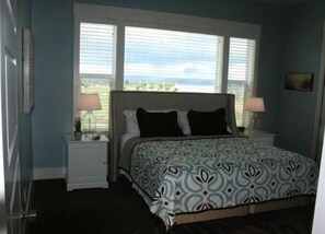 King Size Bed in the Master with Flat Screen.  Views of Lake to N. and to the S.