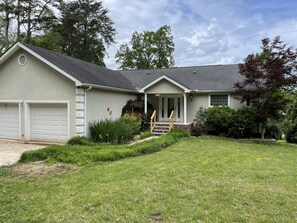 Front of house with 2 car garage