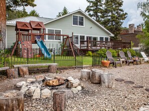 Great play set for kids.  Fenced yard.  Fire pit.