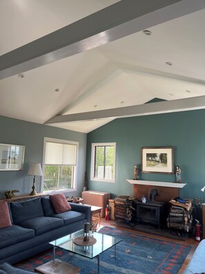 Living room high ceilings and wood burning stove