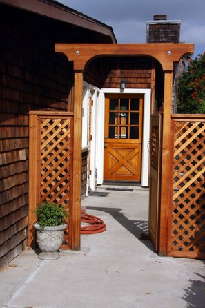 Sunny side yard with dutch door to family room.