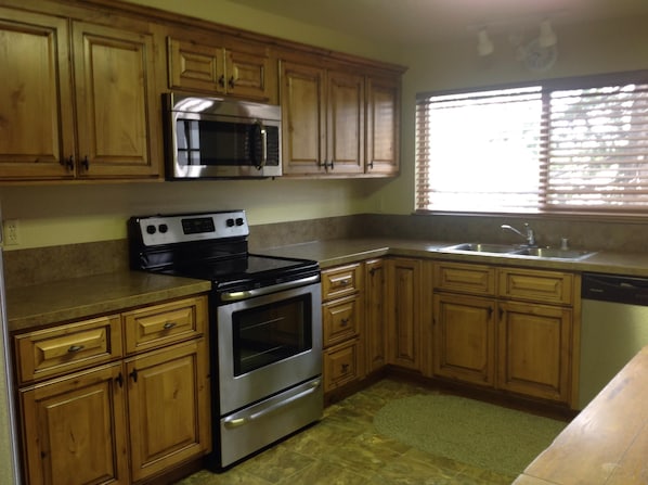 OUR BRAND NEW REMODELED KITCHEN - New flooring, cabinets countertops & appliance