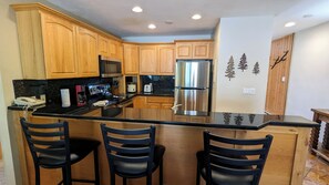 BC West Condo N-2 kitchen with breakfast bar