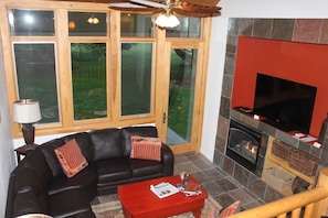 Living Area With Gas Fireplace and Flat Screen TV