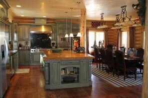 CHEF'S DREAM KITCHEN!!!  BEAUTIFUL CUSTOM CABINETS, W/SEATING for 14! OPEN TO F