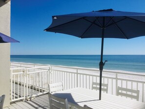 Your view with steps leading to the snow white sand