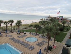 The Other Kiddie Pool & Grassy Area With Plenty of Chairs & Loungers.