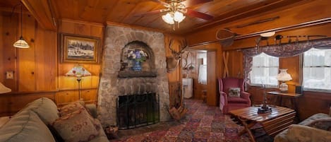 Inviting Parlor - one of two living spaces - with a working fireplace