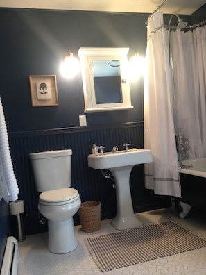 Master bath (off main floor master bedroom) with clawfoot tub and shower