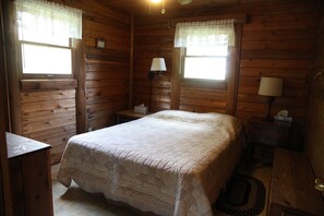 queen bedroom in lake cabin
