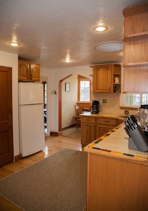 The kitchen and into the breakfast nook.