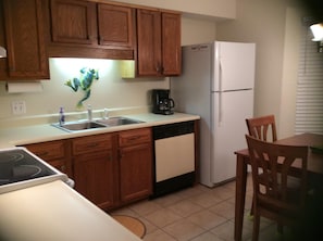 Kitchen is spacious and fully furnished