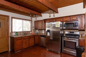 Granite kitchen with nice Stainless Steel Appliances.