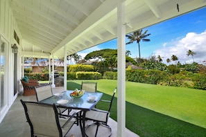 Enjoy a meal or coffee at one of two outdoor tables that seat four people