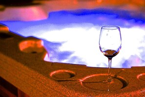 Relax in the private hot tub 