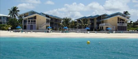 This is a view of Cayman Reef Resort from the sea.