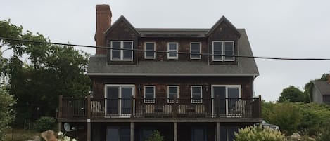 West facing house with deck.