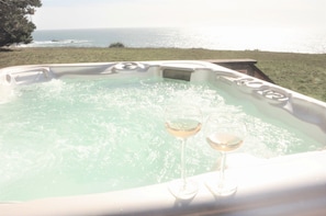 Relax at the end of the day in the hot tub overlooking the ocean!