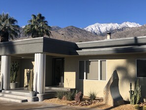 Front yard w/snow capped mountains behind.