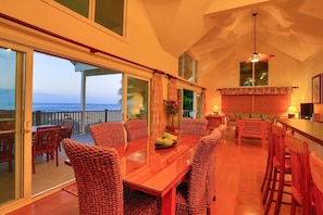 The dining area seats six, and adjoins the living room and kitchen.