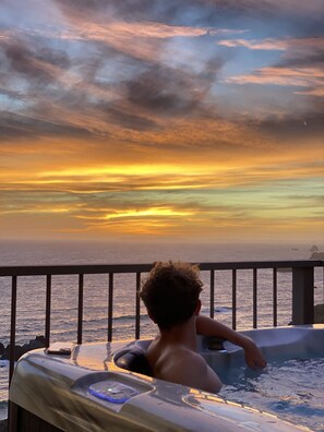 Stunning sunset from the hot tub.  Photo provided by guest.
