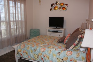 Bedroom 3 with queen bed and a view of the bay
