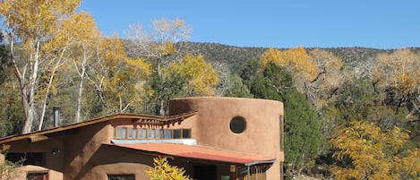 Custom Designed Passive Solar Adobe Home, curved walls, high ceilings, big views