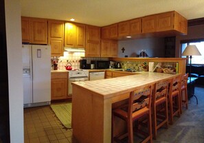 Kitchen and breakfast bar