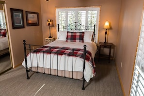 Awesome queen bedroom with lots of natural light.