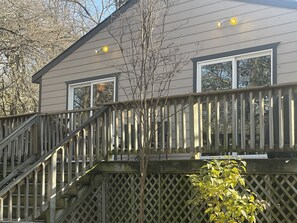 View of Upper Deck.  Complete with dining table and Charcoal Grill