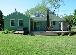 back of house - 26'X15' deck with outside shower, grill, dining table & umbrella