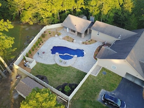 ariel view of pool and pool house