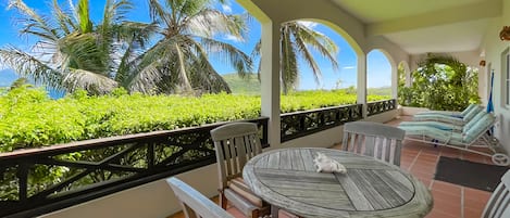 Private veranda with views overlooking the island of Nevis in back ground