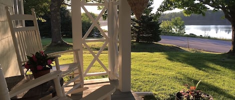 Watch eagles soar and herons fish in the ocean inlet from the covered veranda.