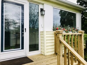 Front entryway with newly built deck. 