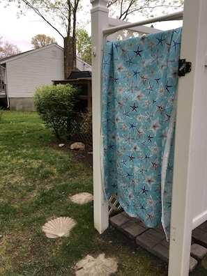 Outdoor shower....a must for the summer!