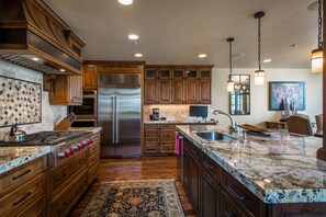 Fully stocked kitchen with high-end appliances