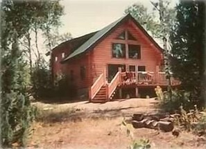 Front of cabin in summer