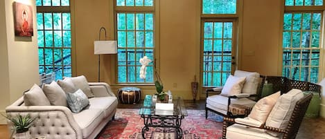 Living Room with large windows overlooking the forest - 1st Floor.