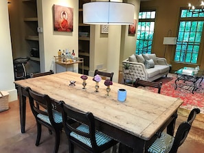 Gather 'round! Mindfully enjoy your meals on an antique French farm table.