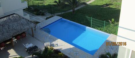 Infinity pool from unit rooftop plaza.