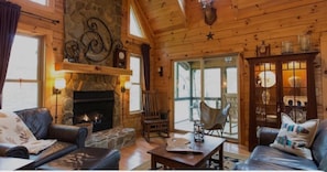 Living Area with cathedral ceiling.