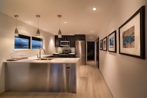 Barn door on right leads to master bedroom