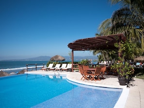 Perfect picnic area by the pool overlooking the bay