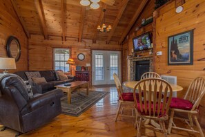 55" TV over double sided fireplace.  NOTE: table was replaced spring 2018.