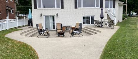 Freshly painted exterior with great patio for BBQ or sitting around fire pit.